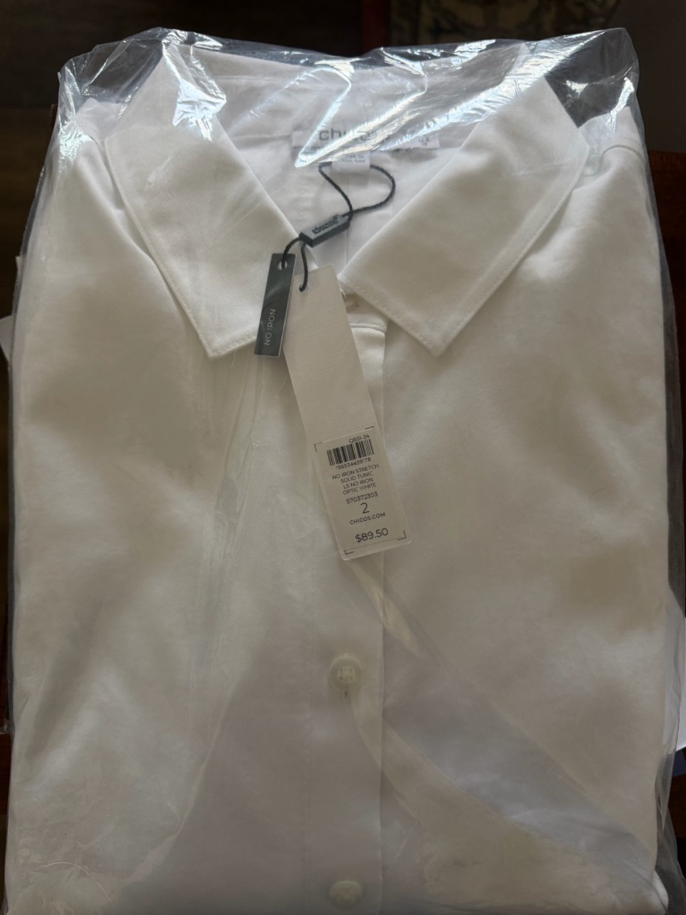 Chico’s No Iron Button-Up Tunic. NWT. Photo on hangar just for reference.